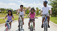 A family on bicycles together