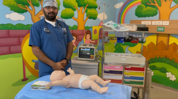 A doctor in a pediatric training facility
